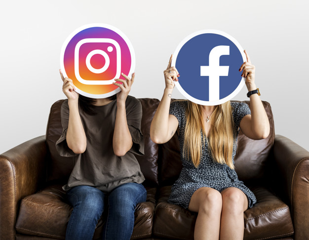 people holding social media icons 53876 63368